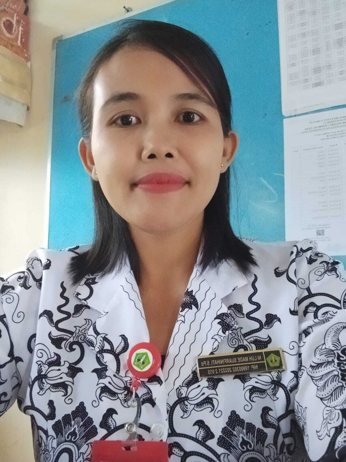 <center>Wali Kelas IV<br>Ni Luh Made Suarfinihati</center>